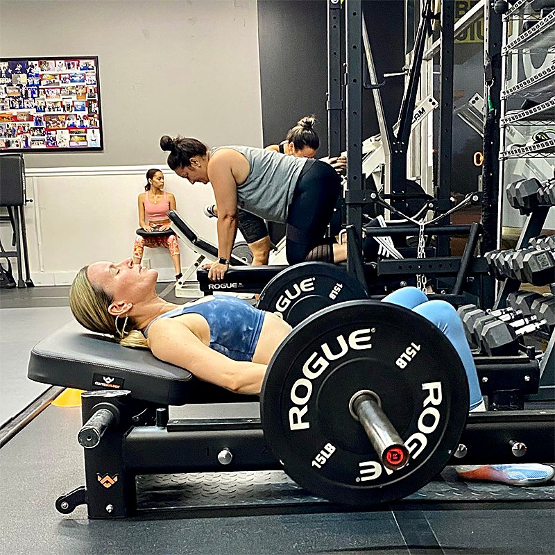 Eagle Fitness members lifting weights at Rollyson Brazilian Jiu Jitsu